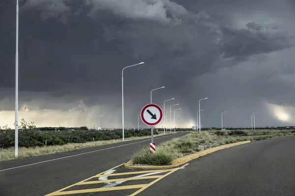 Asphalted road in the middle of a storm. Route 3 Argentina.