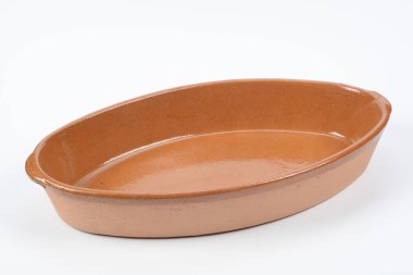 Beyaz yüzey üzerinde kahverengi kase yakın çekim vurdu