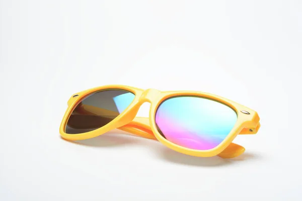 Close Shot Yellow Sunglasses Color Lenses White Surface — Stock Photo, Image