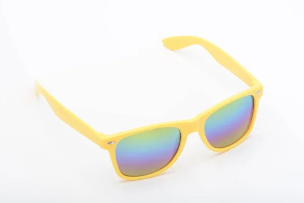 Close Shot Yellow Sunglasses Colorful Lenses White Surface — Stock Photo, Image