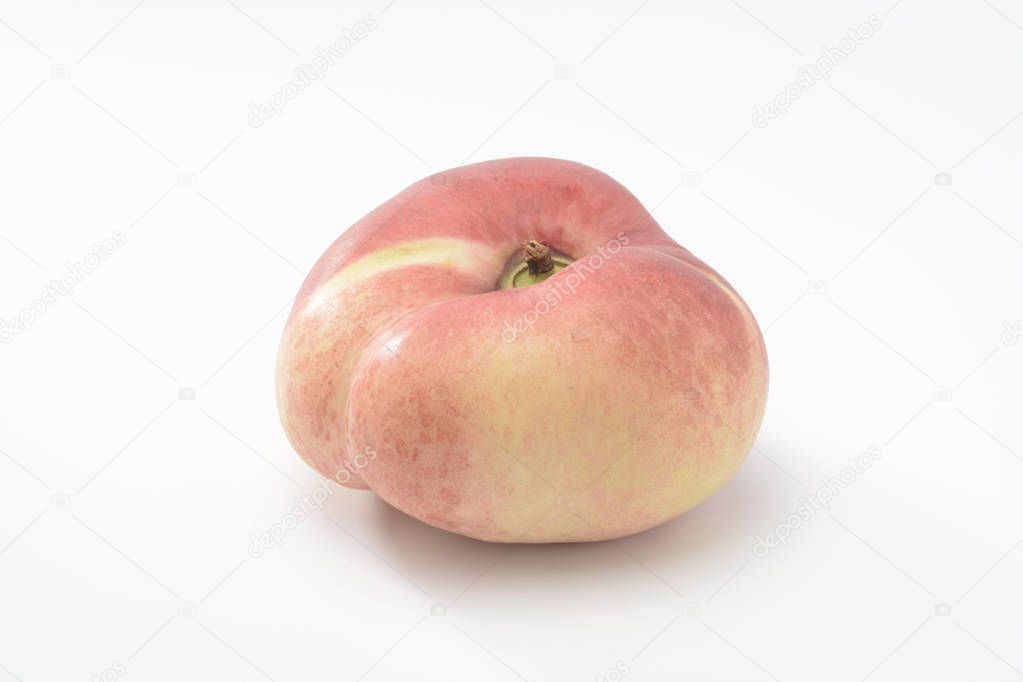 close-up shot of saturn peach on white surface