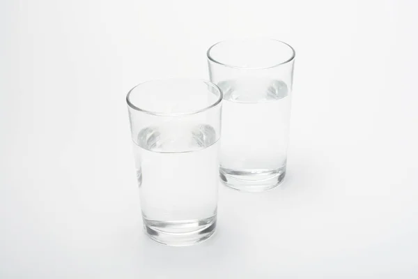 Water in two glasses — Stock Photo, Image