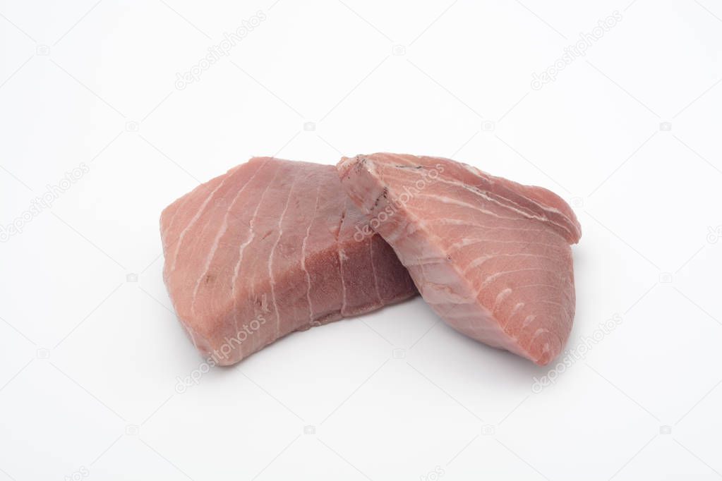 Bonito fillets on white background