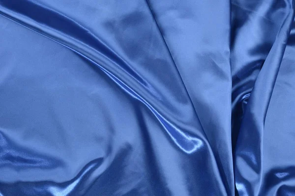 Formas y volúmenes en un tejido azul — Foto de Stock