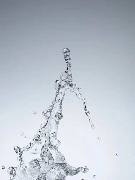 Agua en movimiento sobre fondo blanco — Foto de Stock