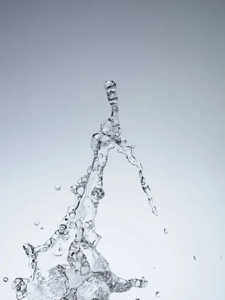 Moving water on white background — Stock Photo, Image