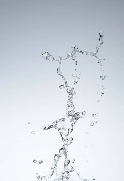 Moving water on white background — Stock Photo, Image