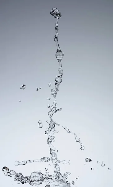 Moving water on white background — Stock Photo, Image