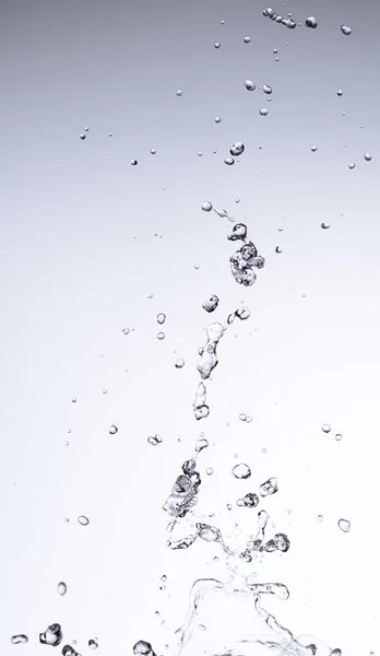 Agua en movimiento sobre fondo blanco — Foto de Stock