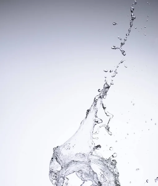 Moving water on white background — Stock Photo, Image