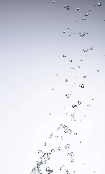 Moving water on white background — Stock Photo, Image