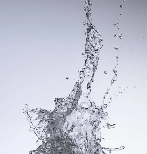 Moving water on white background — Stock Photo, Image