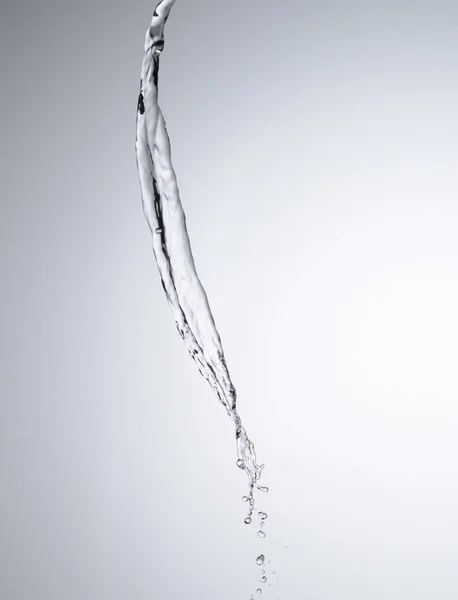 Moving water on white background — Stock Photo, Image