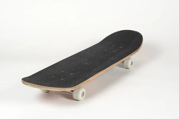 Ein schwarzes Skateboard — Stockfoto