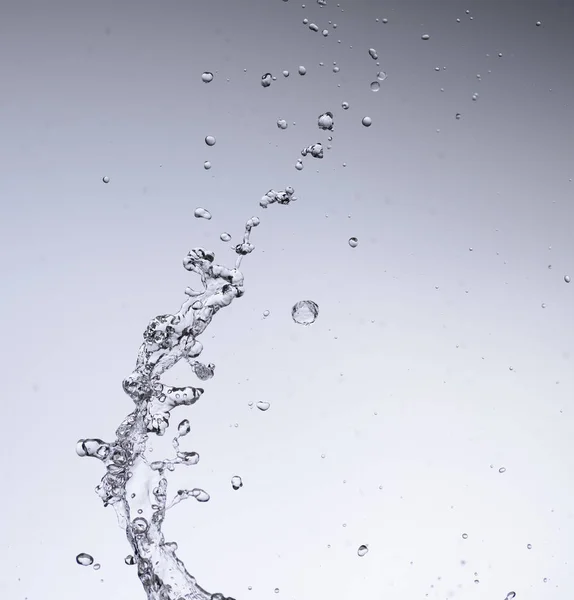 Acqua in movimento su sfondo bianco — Foto Stock