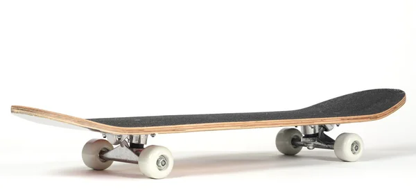 Uno skateboard nero — Foto Stock