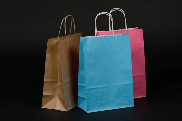 Bolsas Papel Para Compra Sobre Fondo Negro —  Fotos de Stock