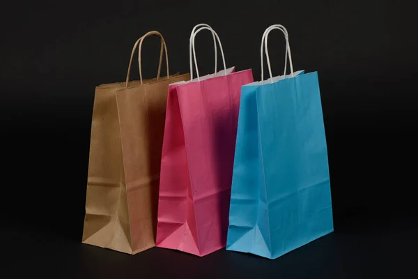 Bolsas Papel Para Compra Sobre Fondo Negro —  Fotos de Stock