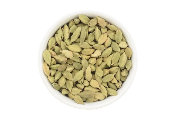 Cardamomo Uma Tigela Cerâmica Branca Sobre Fundo Branco Vista Superior — Fotografia de Stock