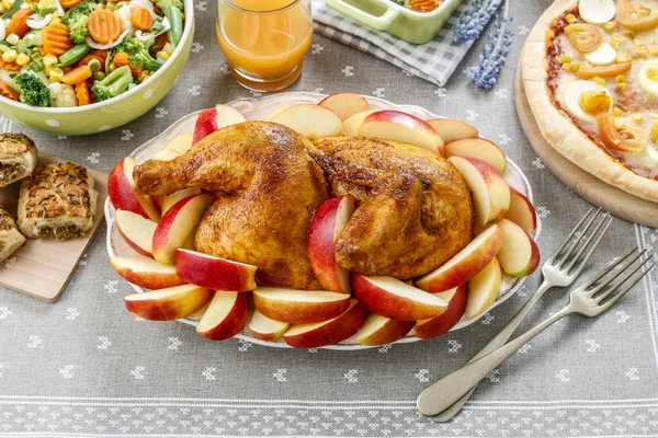 Roasted chicken with apples. Party dish