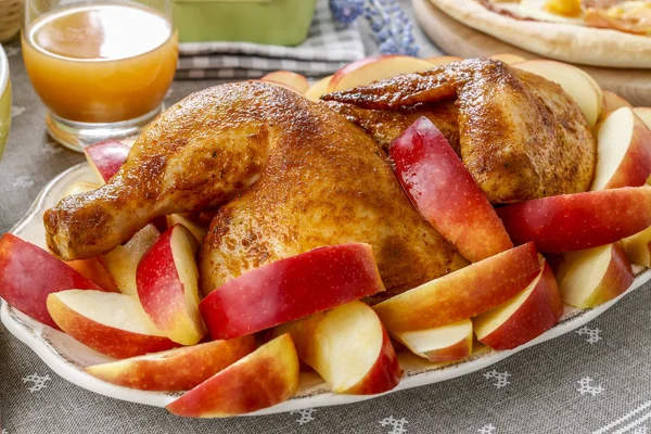 Roasted chicken with apples. Party dish