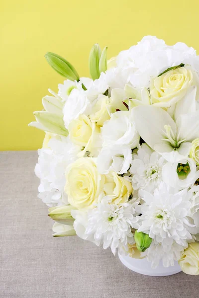 Luxurious floral arrangement with lilies, roses, eustoma, chrysanthemum and hortensia flower. Party decor