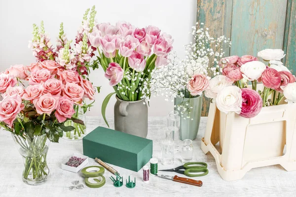 Florist workplace: flowers and accessories. garden hobby