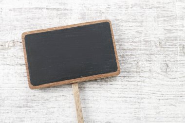 Beyaz bir arka plan üzerinde izole boş yazı tahtası etiket