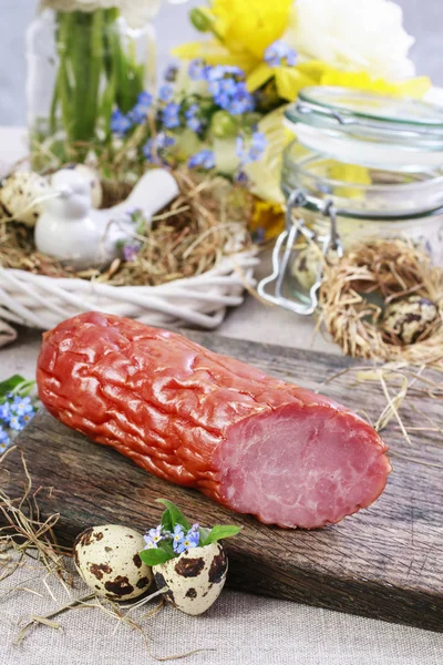 Smoked sausage on the table — Stock Photo, Image