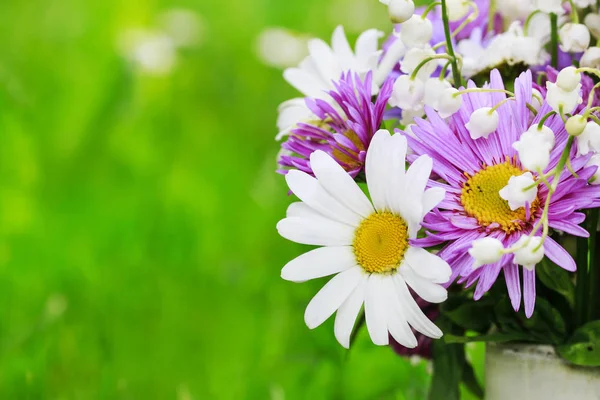 Cute bouquet of daisies, carnations, chamomile and lily of the v — Stock Photo, Image