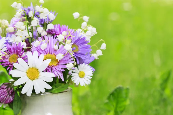 Cute bouquet of daisies, carnations, chamomile and lily of the v — Stock Photo, Image