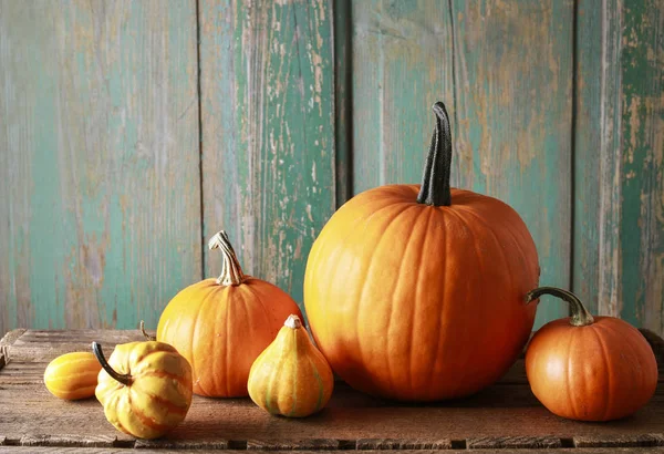 Pumpkins on wooden table, copy space. — Stock Photo, Image