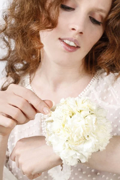 Wrist corsage made of white carnations. — Stock Photo, Image