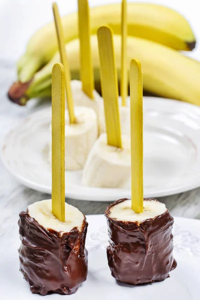 Chocolate dipped bananas. — Stock Photo, Image