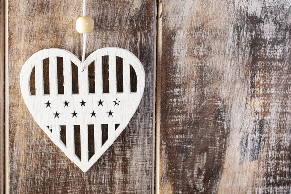 White heart on wooden background — Stock Photo, Image