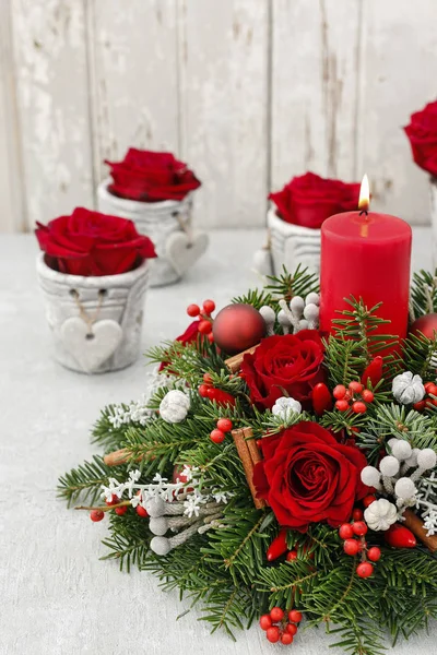 Christmas decoration with red roses, fir, brunia and cinnamon st — Stock Photo, Image