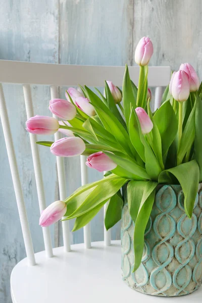 Big bunch of tulips in ceramc vase — Stock Photo, Image