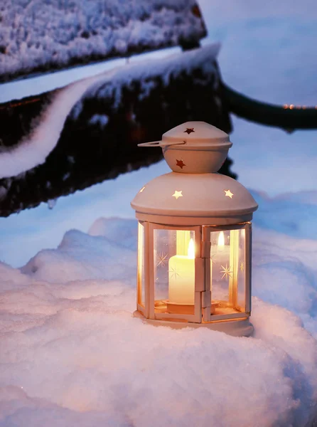 White lantern on snow — Stock Photo, Image