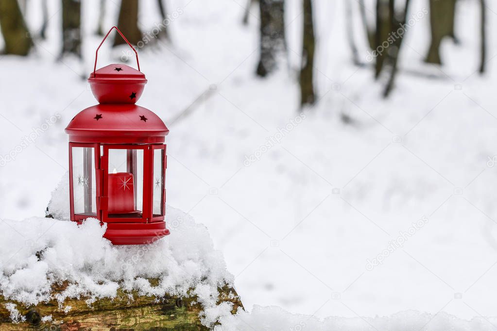 Red lantern on snow