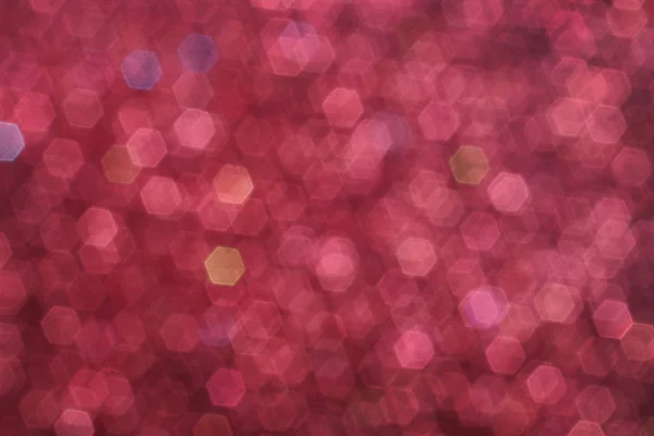Blurred abstract background with red glittering christmas lights — Stock Photo, Image