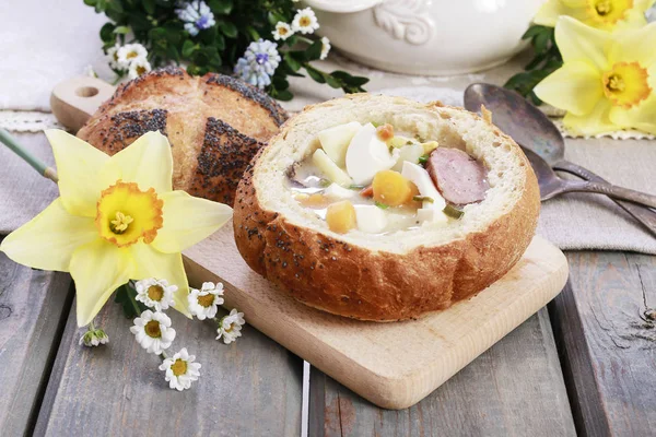 The sour rye soup, easter cakes and saussages on the table. — Stock Photo, Image