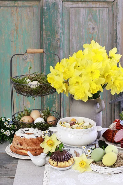 The sour rye soup, easter cakes and saussages on the table. — Stock Photo, Image