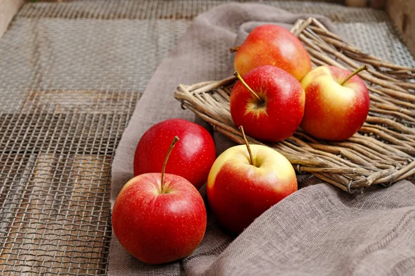 Basked with red apples. — Stock Photo, Image