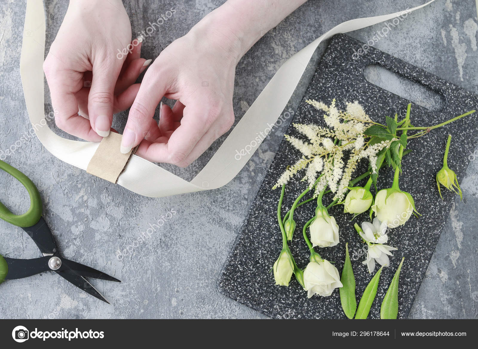 How to make wrist corsage for bride using rose and eustoma flowe Stock