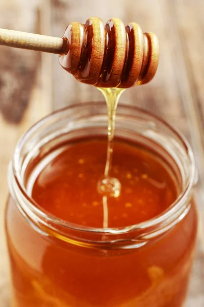 Jar of honey — Stock Photo, Image