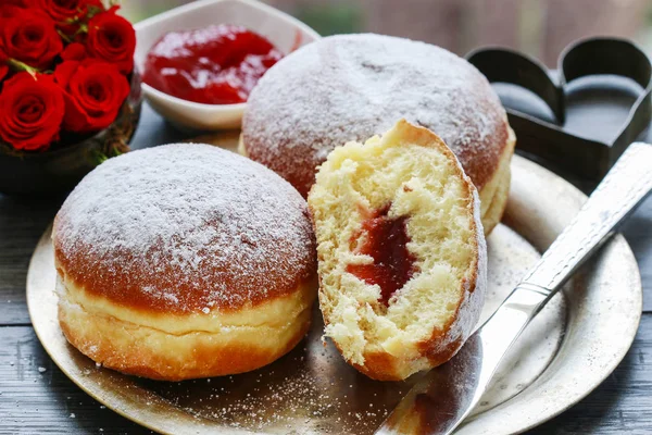 Fat Thursday celebration - traditional polish donuts filled with — Stock Photo, Image