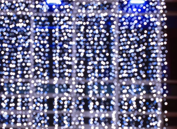 Blurred abstract background with blue and silver glittering chri — Stock Photo, Image