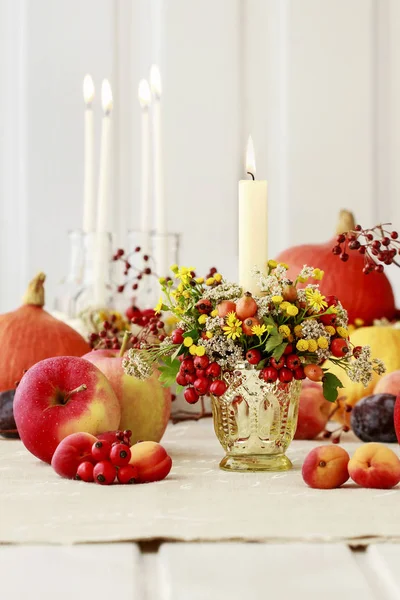 Autumn candle holder decorated with rose hip, hawthorn berries a — Stock Photo, Image