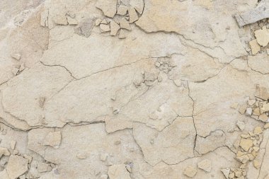 Ezilmiş kaya arka planı. Çatlak yapı, soyut motif. 
