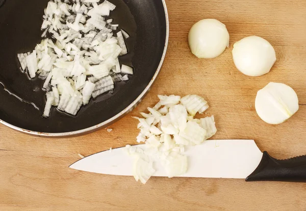 Chopped onion in a pan.